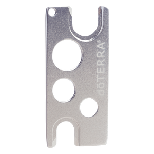 Tool for removing applicators from oil bottles